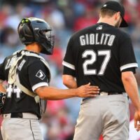 Lucas Giolito of White Sox talks with catcher